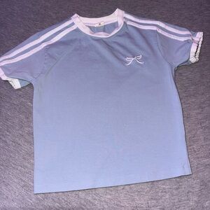 Vibe Light Blue Tee with White Trim & Bow Accent